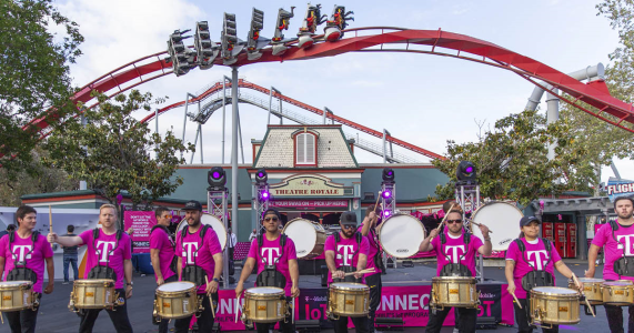 marching band at amusement park product launch event